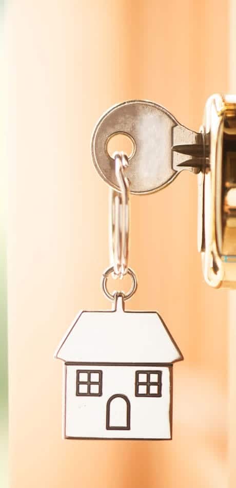key in lock with house keyring