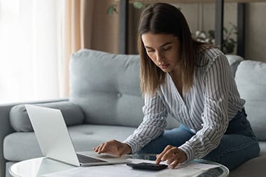 lady working on a computer at table